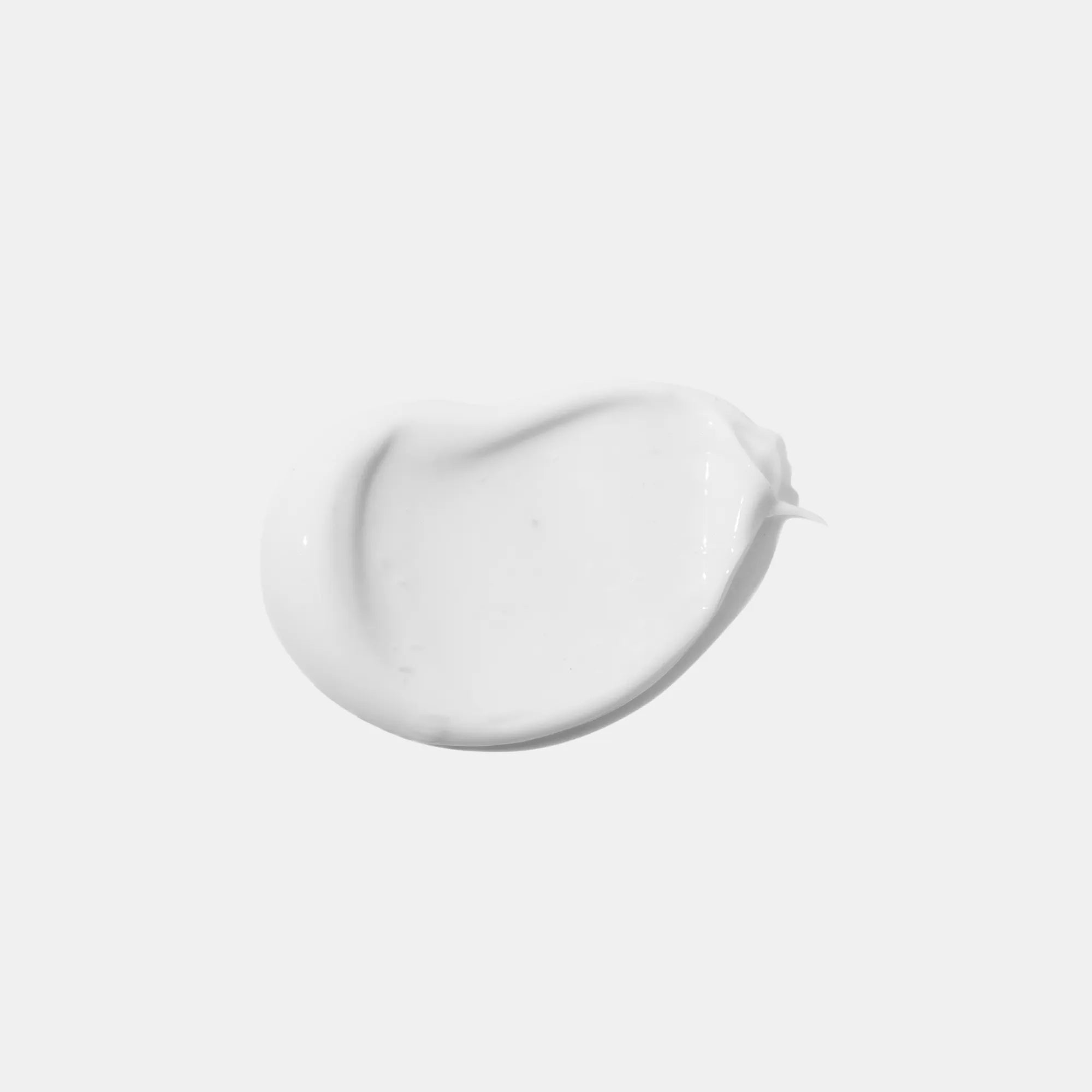 texture crème blanche fond blanc