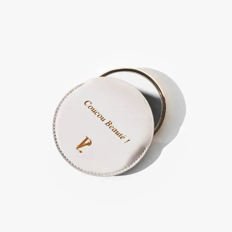 miroir de poche fond blanc