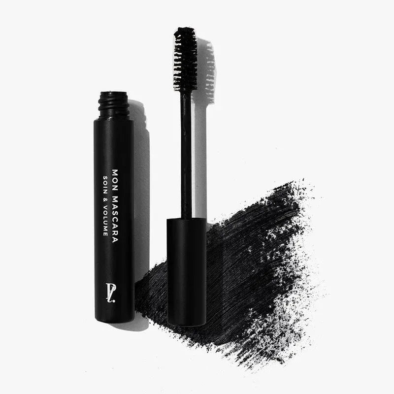 mascara noir ouvert et texture fond blanc