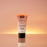 crème solaire SPF50 fond coucher de soleil